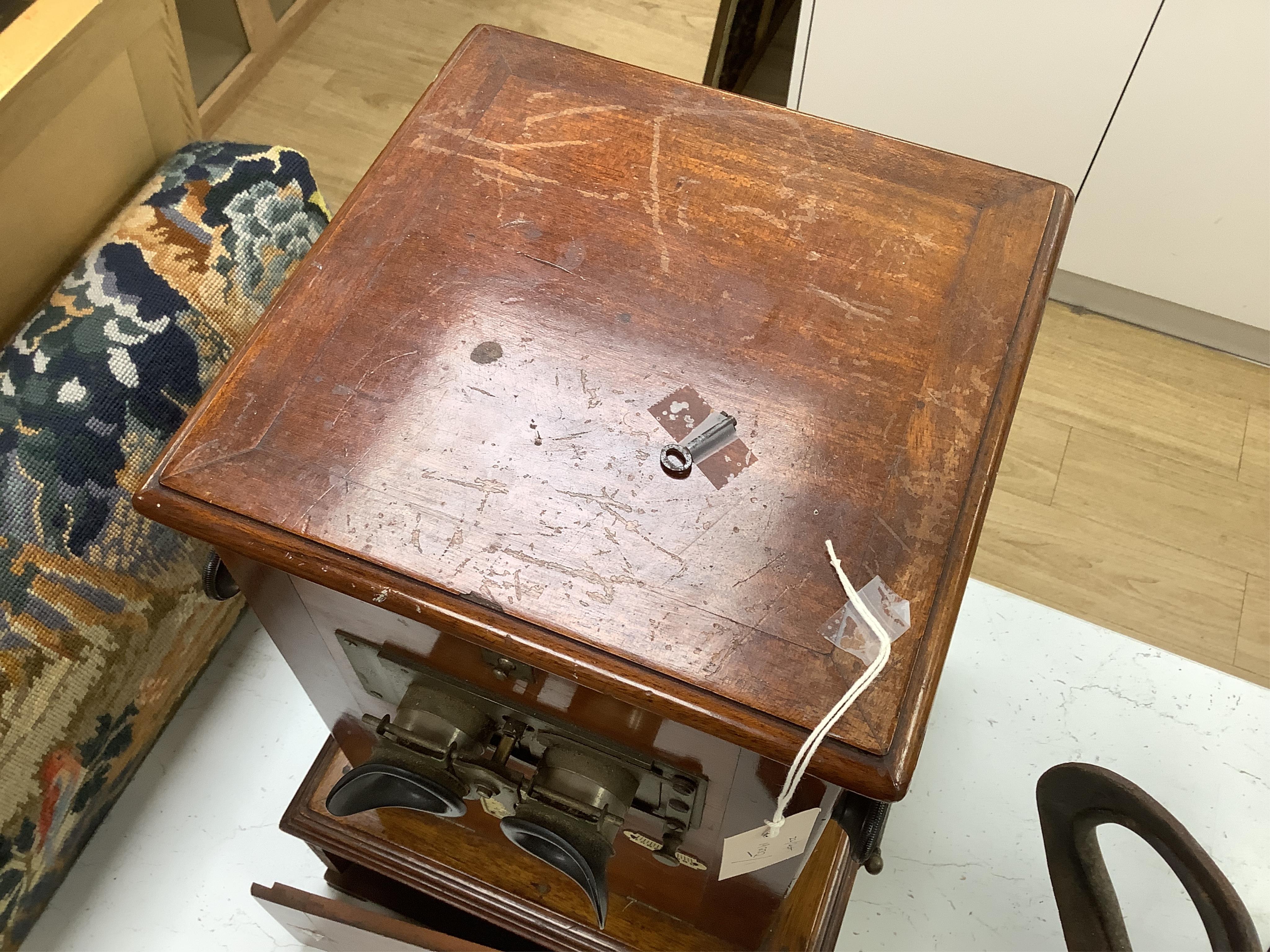 A late 19th century French mahogany Taxiphote stereoscopic table top viewer, 51cm high, 33cm wide